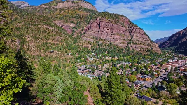 Perimeter Trail overlook reveals the historic town of Ouray nestled deep within steep rugged peaks of the Colorado San Juan Mountains
