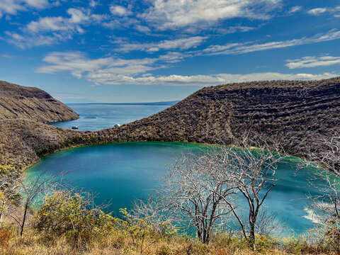 Isabela Island in the Gal&aacute;pagos Archipelago. Darwin Lake, a saltwater crater lake inside a tuff cone, and Tagus Cove in the background