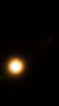 Sun flare on the black background