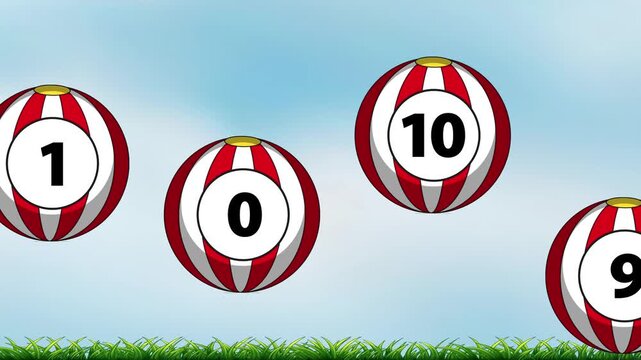 Numbered Red and White Striped Balls Bouncing on Green Grass