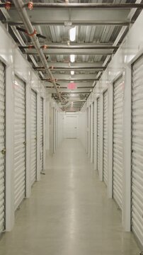 Self storage hallway at self storage facility zoom in vertical video