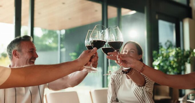 People, hands and cheers with wine glass in home for get together, dining event or social gathering. Happy, group or friends with toast or alcohol for drinking, celebration or holiday dinner in house