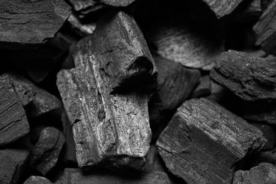 Energy and fuel production, natural charcoal pieces for barbecue and industrial heating, carbon texture and raw material for sustainable energy supply