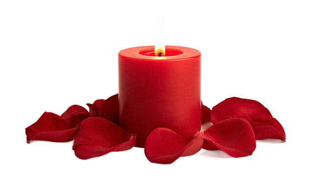 Lit red candle surrounded by rose petals isolated on transparent background