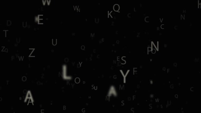 Floating letters of the alphabet moving slowly against a dark background typography text font character literacy