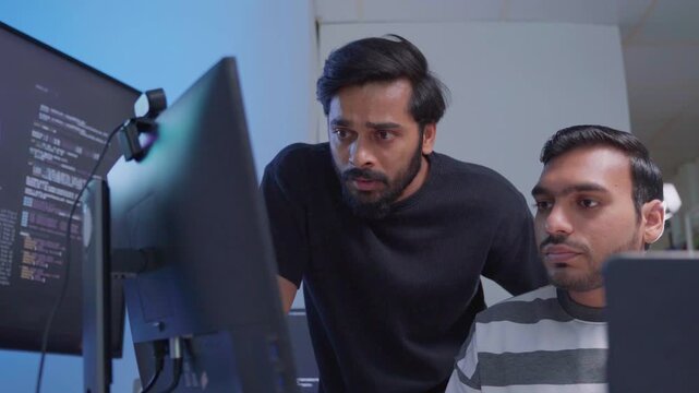 Team engineers software development are brainstorming using computer writing code. Programmer teamwork meetings using technology artificial intelligence work system about cyber security and coding