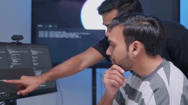 Team engineers software development are brainstorming using computer writing code. Programmer teamwork meetings using technology artificial intelligence work system about cyber security and coding