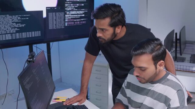 Team engineers software development are brainstorming using computer writing code. Programmer teamwork meetings using technology artificial intelligence work system about cyber security and coding