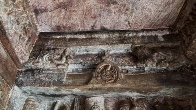 Ancient stone carvings inside the Badami Cave Temples in Karnataka, India, showcasing intricate craftsmanship and historic Indian rock-cut architecture
