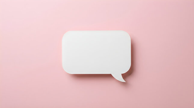 Minimalist white speech bubble on a solid soft pink background, providing a clean copy space for text, messages, or design concepts