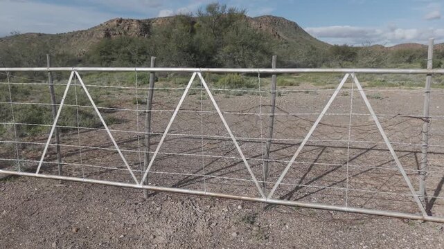 rustic karoo farm gate in rural countryside landscape
