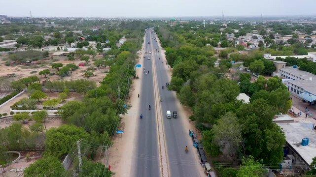 Drone Shot of Asphalt Road and Trees in Thatta City Sindh Pakistan