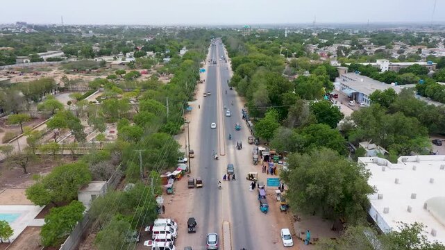 Aerial View of Busy Highway Road Passing Through Town in Thatta Sindh