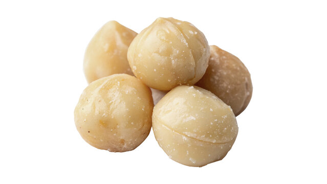 Small pile of raw peeled macadamia nuts isolated on transparent background