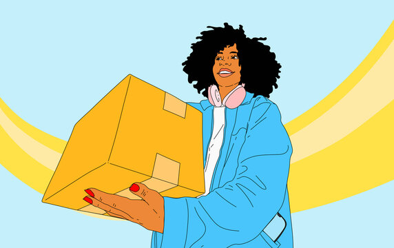 Smiling young woman with headphones carrying package