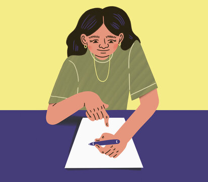 Woman writing with pen and paper at table