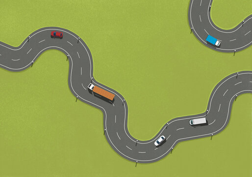 Aerial view of green rectangle over truck driving on winding road