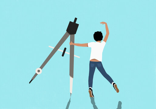 Carefree teenage boy dancing with drawing compass against blue background