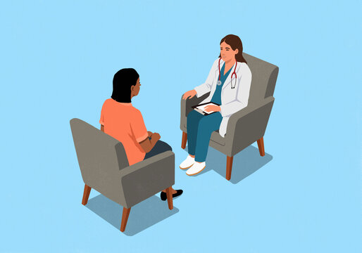 Female doctor talking face to face with patient against blue background