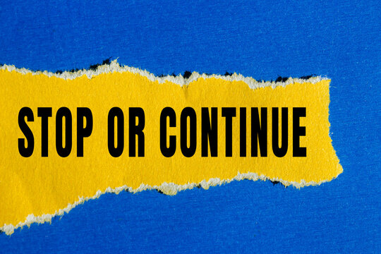 Stop or Continue text concept photo