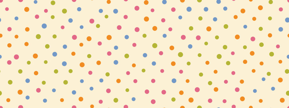 Multicolor confetti dot seamless pattern. Hand drawn brush dots background. Scattered polkadot texture for wrapping paper and party design.