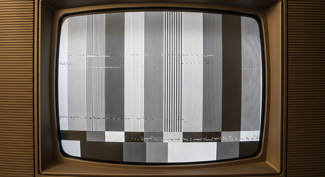 Vintage Television Screen displaying Monochrome Test Pattern Signal with Static Distortion