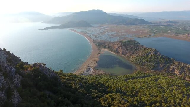 Aerial drone scene captures Iztuzu lagoon and wetlands near Dalyan, Turkey.