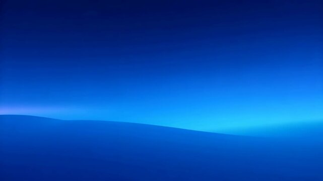Blue gradient sky transitioning to horizon with distant light source and undulating terrain silhouette