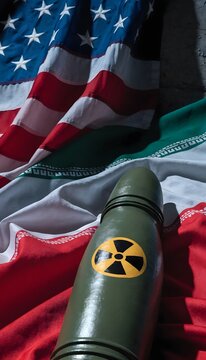 Nuclear Bomb on US and Iran Flags &ndash; Geopolitical Tension and Conflict Concept