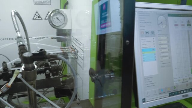 A sample of the new CR injector tester was presented at the exhibition. Closeup. Shot in motion