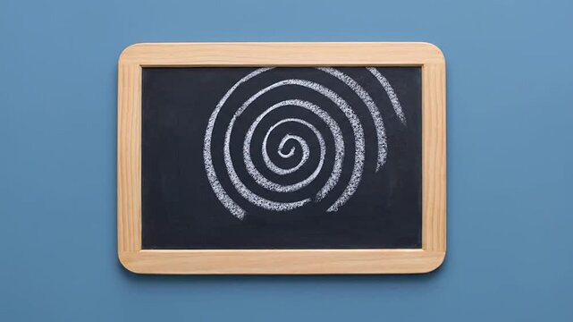 Stop Motion Chalk Animation of an Expanding Spiral and Sound Waves Drawn on Slate Chalkboard over Blue Surface