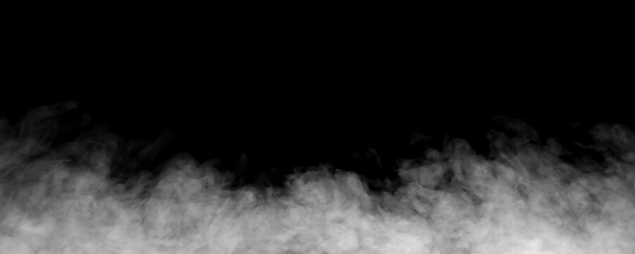 Set of white smoke or steam plumes rising and floating along the bottom isolated on black background. Collection of fog, mist, and vapor overlay effects for creative graphic designs.
