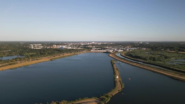 Mechelen water reservoir with white manor near green landscape in Belgium, panoramic view