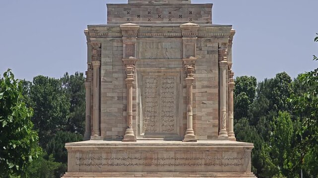 Ferdowsi Tomb in Iran rises in daylight as a historic Persian mausoleum landmark.
