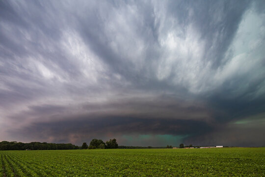 Cyclic Supercell storm cloud over green field near charleston