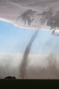 Landspout tornado over field in fowler, colorado