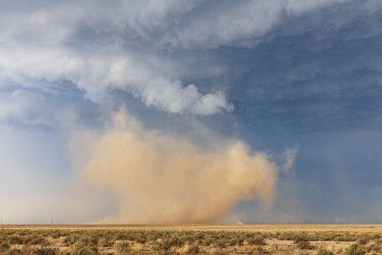 Land spout tornado kicking up dust near fowler, colorado