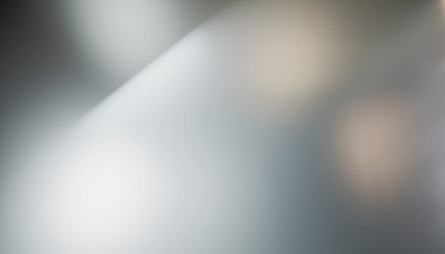 Blurred abstract background with soft lighting and neutral gray