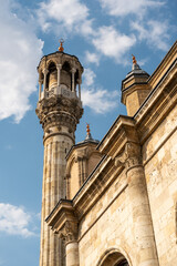 Fototapeta premium Aziziye Mosque minaret and historic stone facade in Konya Turkey