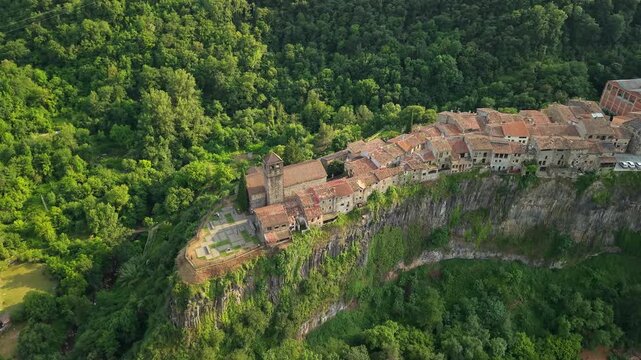 Aerial View of Castellfollit de la Roca Village on a Basalt Cliff