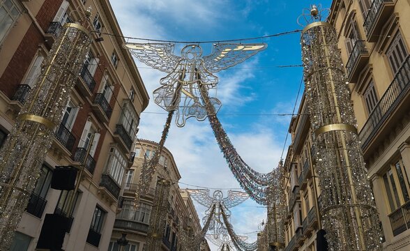 Christmas Angel Lights Above a City Street