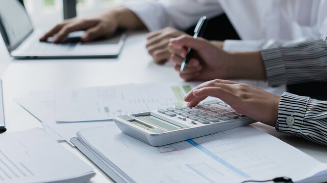 Accountant team discusses financial project and collaborates during meeting