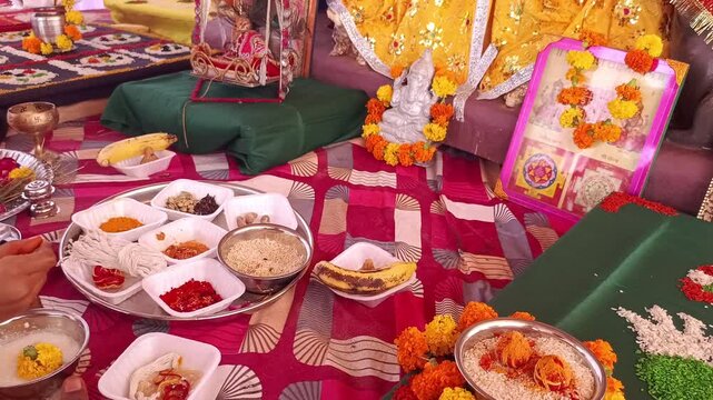 Traditional Hindu Ganesh Puja Ceremony with Religious Offerings