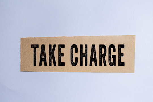 TAKE CHARGE text concept photo