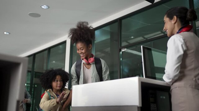 Family and Businessman Waiting at Check-In Counter