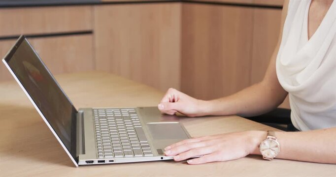 Lifestyle videos indoor of people doing activities at office, using laptop, woman working on busines
