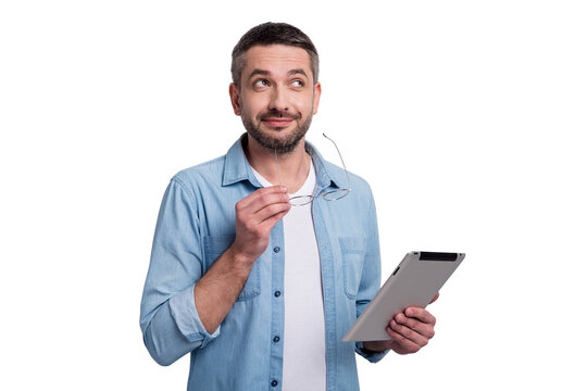 Close-up portrait of his he nice attractive cheerful dreamy creative smart gray-haired guy holding in hands ebook creating IT strategy blogging isolated over gray light pastel color background