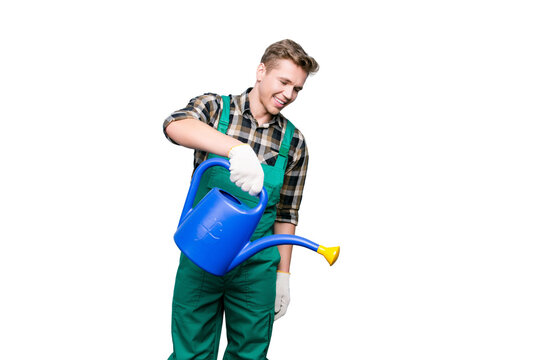 Domestic person cultivate concept. Portrait of cheerful glad excited joyful handsome hard-working gardener wearing checkered outfit watering flowers, isolated on grey background empty blank place