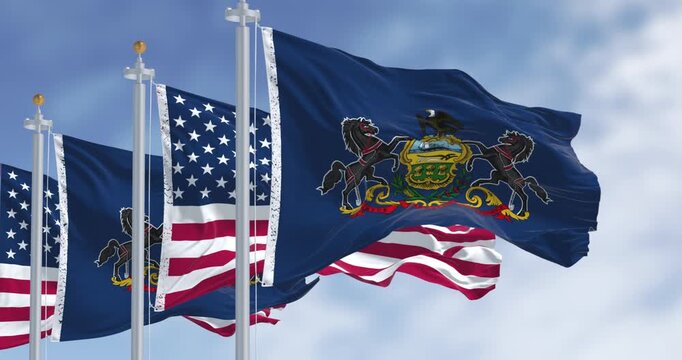 Pennsylvania state flag waving with the american flag