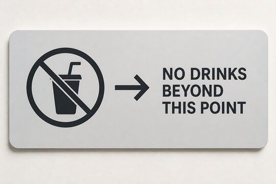 A rectangular sign with a no drinks symbol and an arrow pointing to the text NO DRINKS BEYOND THIS POINT is displayed against a light background.